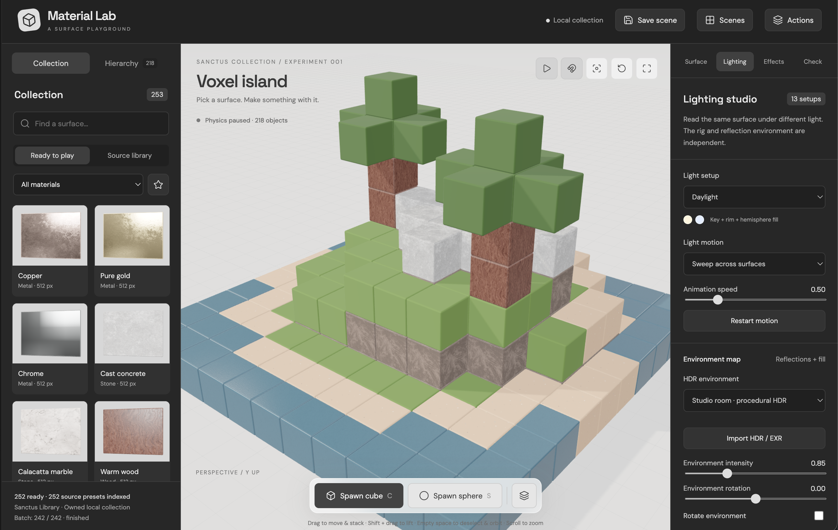 Material Lab showing a voxel island built from textured cubes, a material collection, and lighting controls
